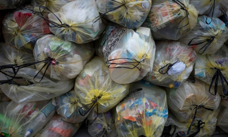 Pile of trash bags filled with garbage