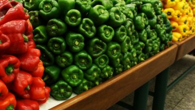 Colorful bell peppers displayed at a market