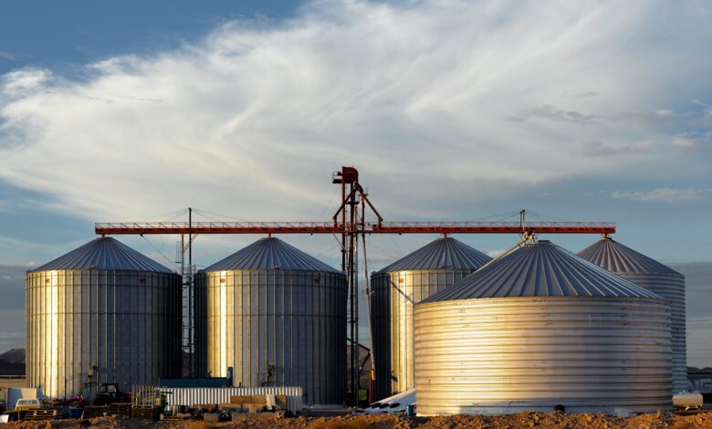 a group of large metal tanks sitting next to each other