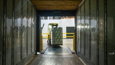 yellow and black forklift during daytime