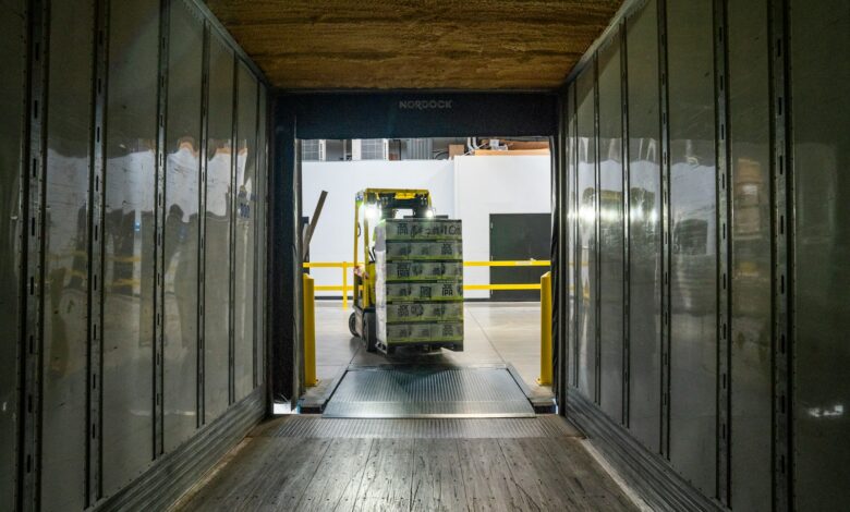 yellow and black forklift during daytime