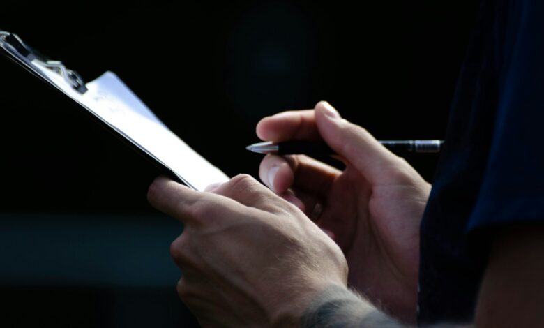a close up of a person holding a cell phone