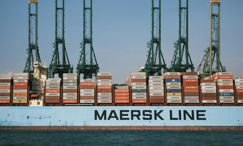 cargo ship on body of water during daytime