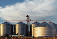 a group of large metal tanks sitting next to each other
