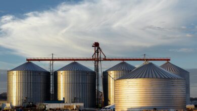 a group of large metal tanks sitting next to each other