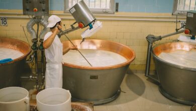 a person washing a sink