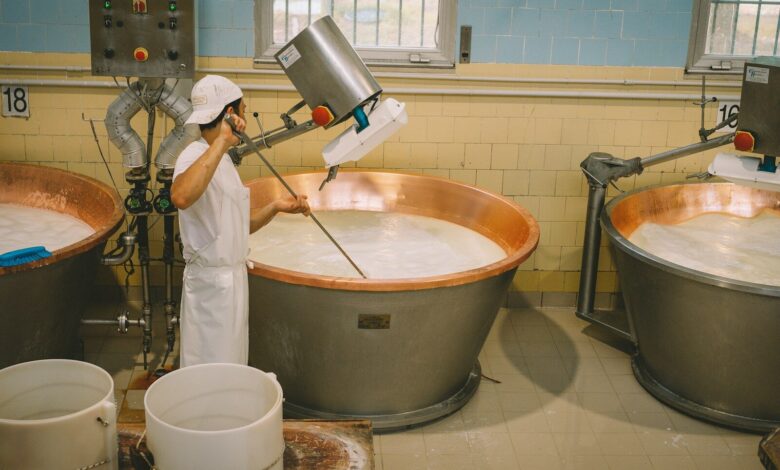 a person washing a sink