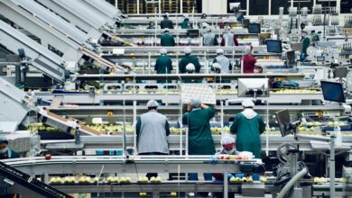 a group of people in a factory