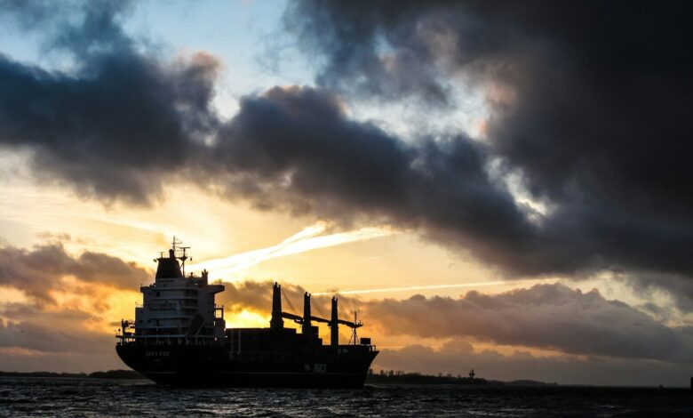 ship sailing during sunset